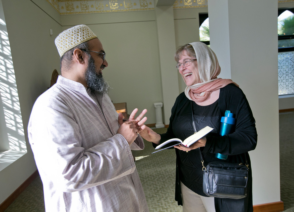 Moldaw Residence resident Janice Weinman, 73, right, chats with minister Amin Saheb Huzefa Poonawala, left, during a visit to the Palo Alto mosque (Masjid) in Palo Alto, Calif., on Tuesday, Nov. 17, 2015. Members of the Mosque follow Dawoodi Bohra, a sub-sect of Shia Islam. (LiPo Ching/Bay Area News Group)